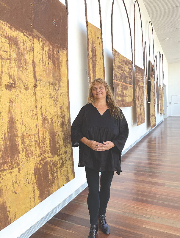 Lorraine Connelly-Northey, pictured with her installation Narrbong-galang (many bags). Picture: the artist and the Art Gallery of New South Wales.