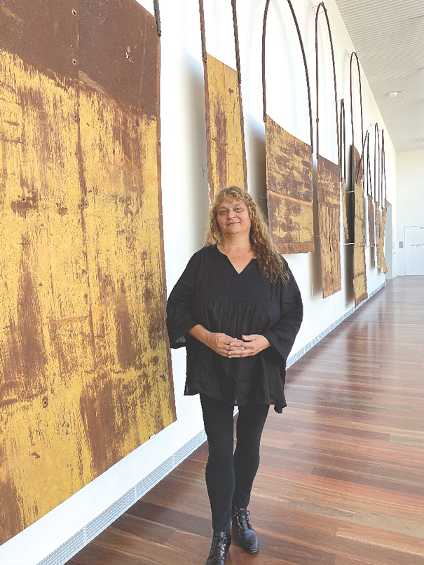 Lorraine Connelly-Northey, pictured with her installation Narrbong-galang (many bags). Picture: the artist and the Art Gallery of New South Wales.