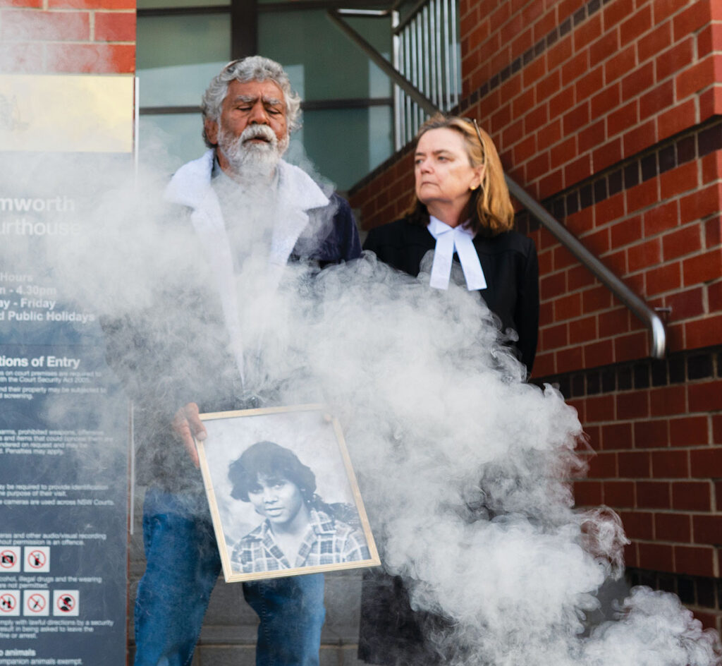 Uncle Don ‘Duck’ Craigie and deputy state coroner Harriet Grahame during a smoking ceremony. Picture: AAP.
